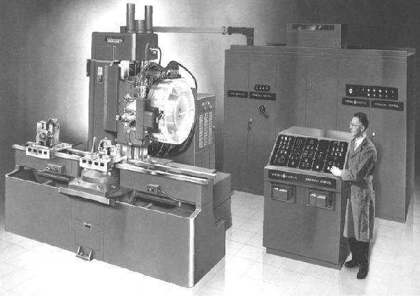 photo of large computerized numerical control (CNC) machine from the 1970s