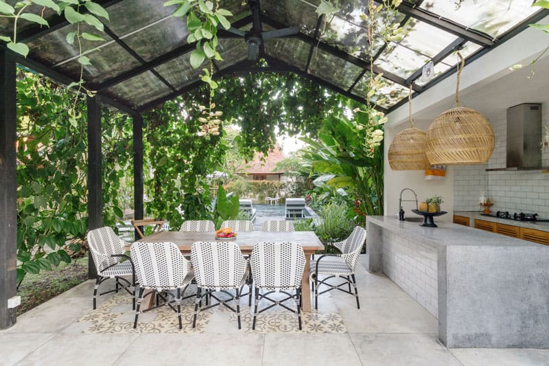 Outdoor kitchen covered by a canopy