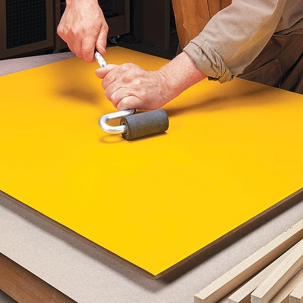 rolling laminate post adhesion to timber